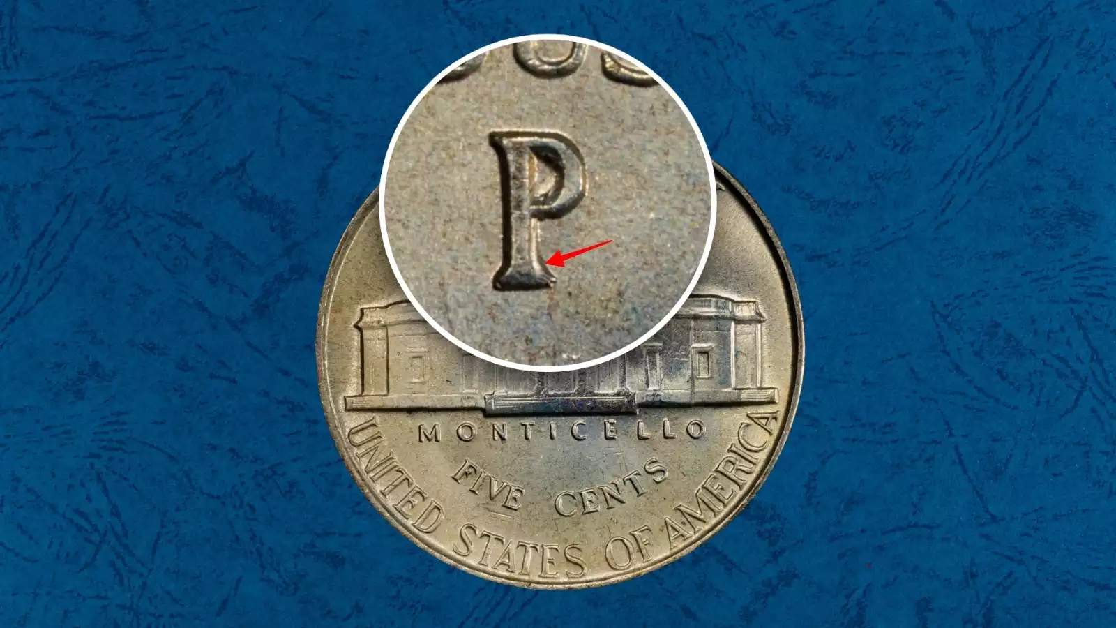 1942-P/P Repunched Mintmark on silver war nickel reverse showing two offset P impressions above Monticello dome